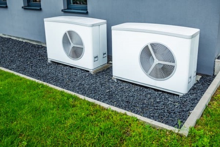 two-air-source-heat-pumps-installed-outside-of-new-2025-01-10-12-40-23-utc (1).jpg